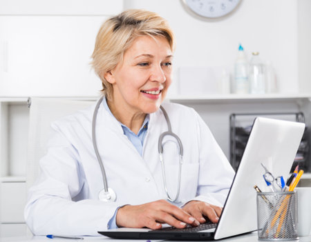 Doctor in gown waiting for patient