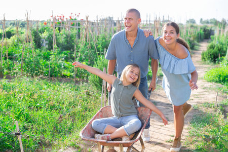 Family resting in garden