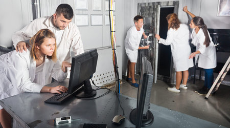 Adults trying to get out of escape room