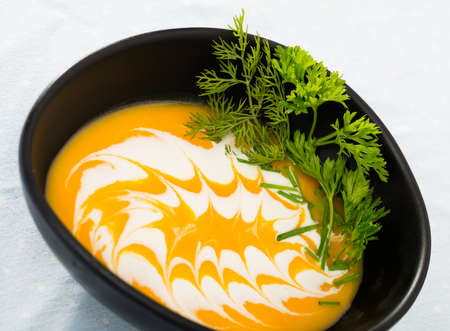 Delicious pumpkin cream soup with gingerの写真素材