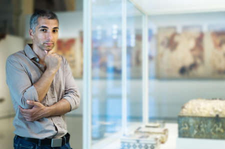 Man is looking at the expositionの写真素材