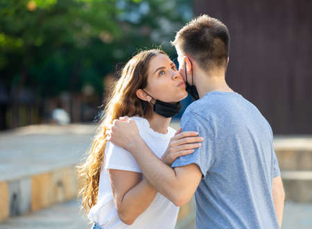Girl is kissing a guyの写真素材