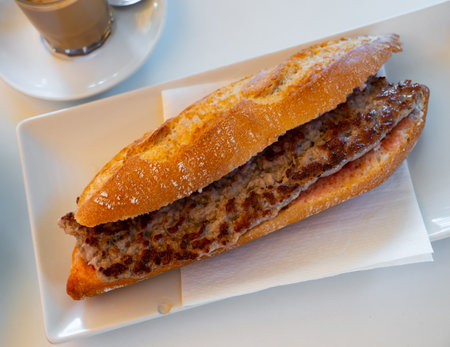 Hot sandwich with Longaniza sausage with sauceの写真素材