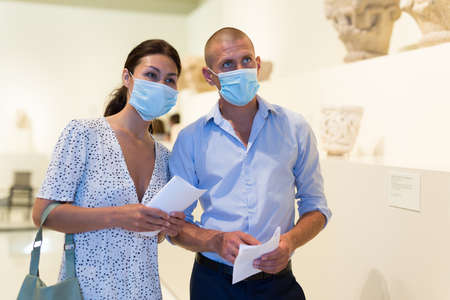 Man and woman in galleryの写真素材