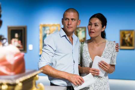 couple admiring art workの写真素材