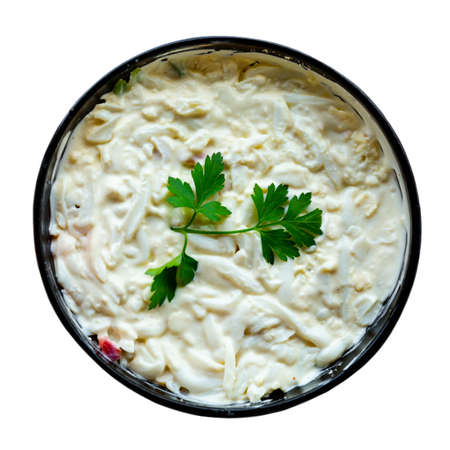 Healthy squid salad with cucumber, mayonnaise and parsleyの写真素材