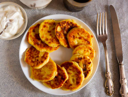 Popular curd dish of Russian cuisine called cheese pancakesの写真素材