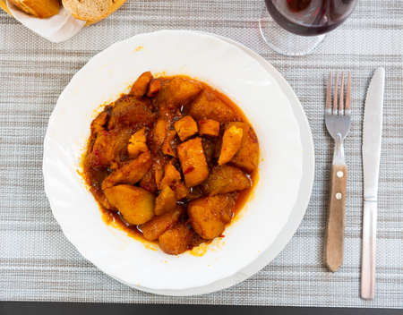 Patatas con sepia, stewed cuttle with potatoesの写真素材