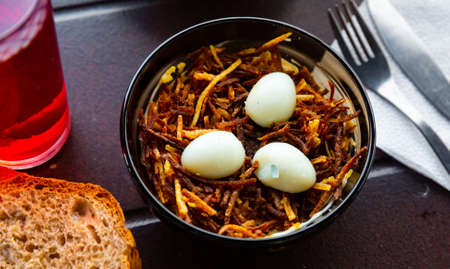 Russian salad - boiled eggs and fried potatoes closeupの写真素材