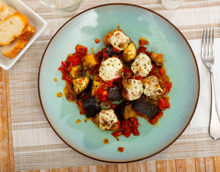 Meat balls with cheese and stewed eggplantsの写真素材