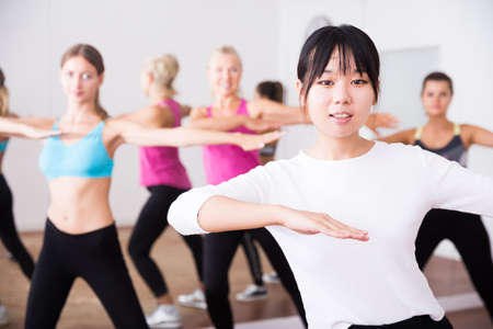 Chinese trainer leads a dance groupの写真素材