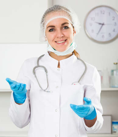 Female doctor waiting for patientsの写真素材