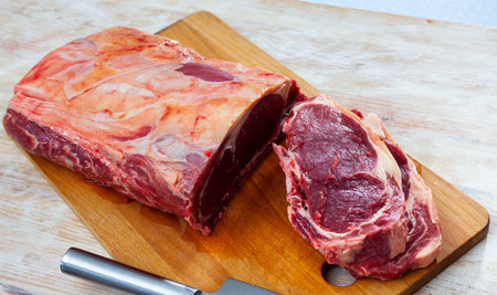 Closeup of beef tenderloin on cutting board