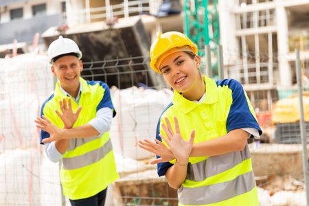 Portrait of two active positive civil engineers