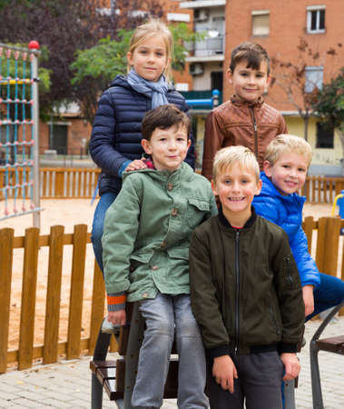 Happy kids on playgroundの写真素材