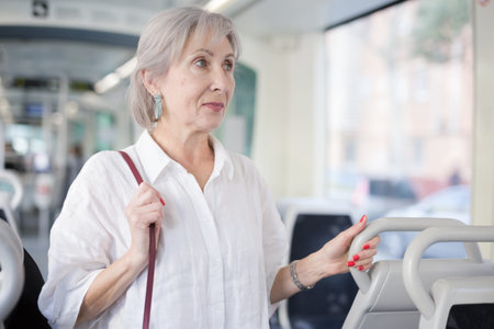 Mature lady in bus