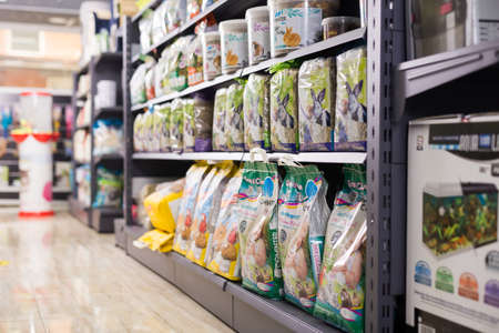 Barcelona, Spain - October 10, 2021: Assortment of dry pet food for sale in pet shopのeditorial素材