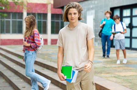 Portrait of teenager boy going to school lessons on summer dayの写真素材