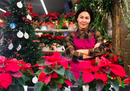Portrait of flower shop owner with crossed armsの写真素材