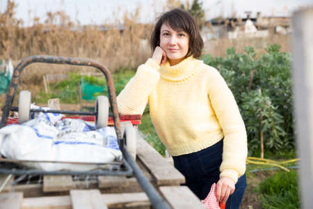 Portrait of thoughtful gardenerの写真素材