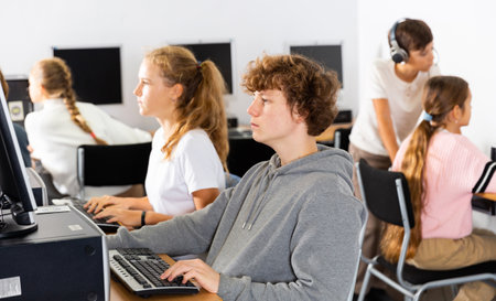 Teenagers in computer classの写真素材