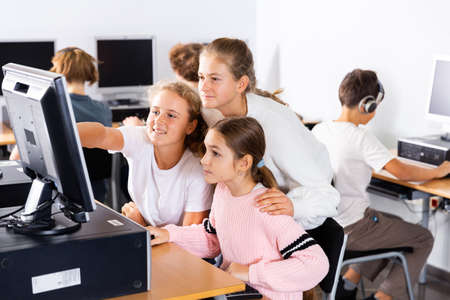 Teenagers in computer classの写真素材