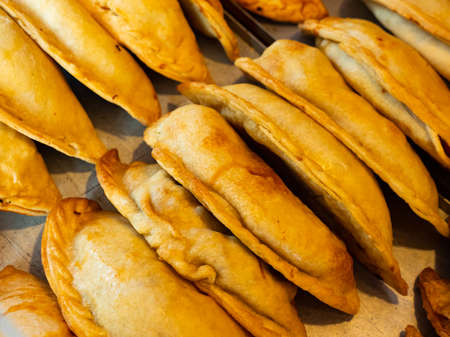 Baked snack empanada at marketの写真素材