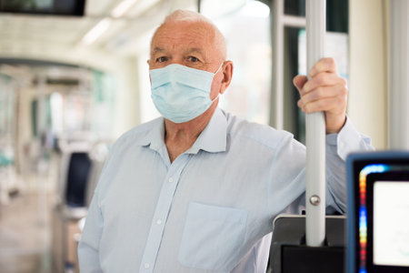 Old man in streetcarの写真素材