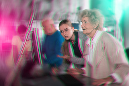 Young girl and boy thinking about riddle solution with their grandparents in escape room.