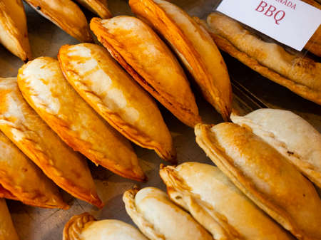 Baked snack empanada at marketの写真素材