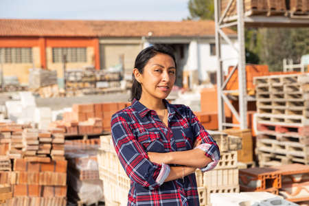 Portrait of woman seller of building materials at an open-air siteの写真素材