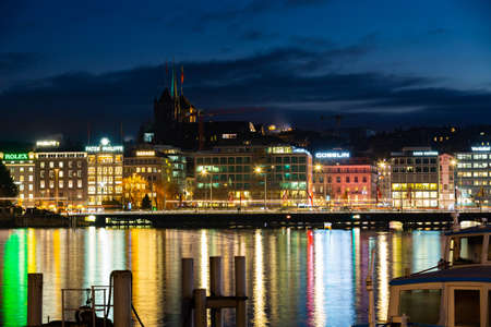 GENEVA, SWITZERLAND - DECEMBER 30, 2021: Evening view of the city Mont Blanc embankmentのeditorial素材