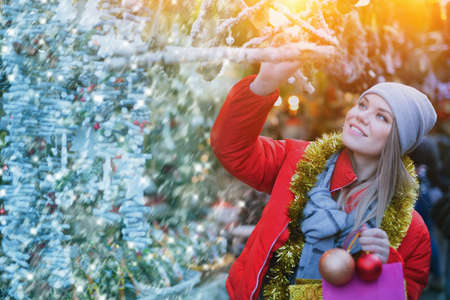 Girl shopping Christmas decorationsの写真素材