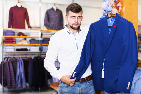 owner guy displaying jacketの写真素材