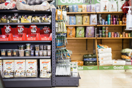 Barcelona, Spain - October 10, 2021: Assortment of dry pet food for sale in pet shop