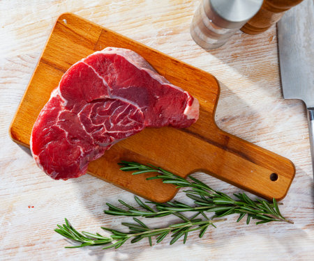 Raw beef fillet with rosemary