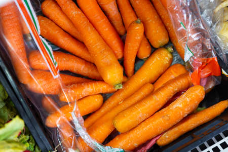 Pile of orange carrots in marketの写真素材