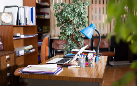 Interior of empty office with wooden furnitureの写真素材
