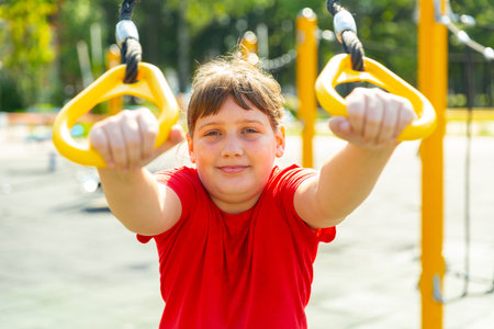 Smiling girl on outdoor playground