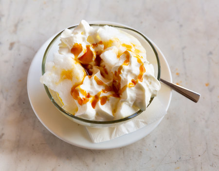 Ile flottante with caramel sauce, french dessertの写真素材