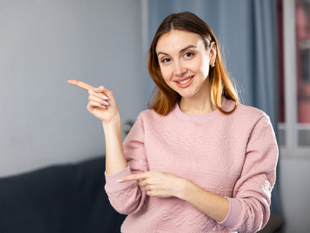 Portrait of a positive young womanの写真素材