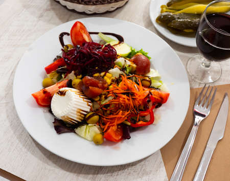 Ensalada con queso fresco, salad with cheese and vegetablesの写真素材
