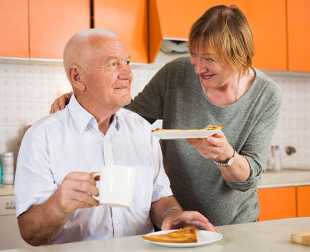 Senior couple having breakfastの写真素材