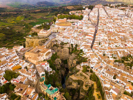 Ronda landscape and buildings with Puente Nuevo Bridge, Andalusia, Spainの写真素材