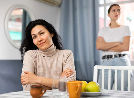 Two women having quarrel at homeの写真素材