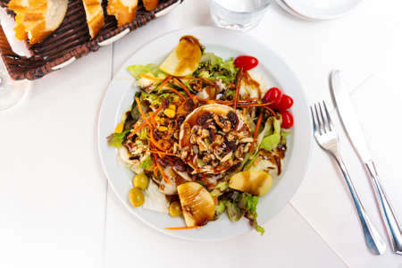 Portion of goat cheese saladの写真素材