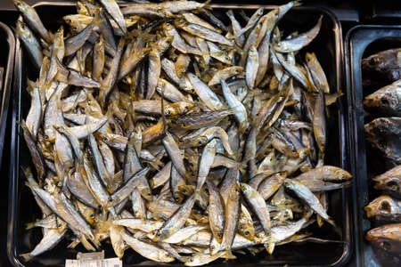 Cold smoked fish on store counterの写真素材