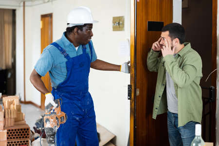 Flatmate is dissatisfied with the noise from drill and repairsの写真素材
