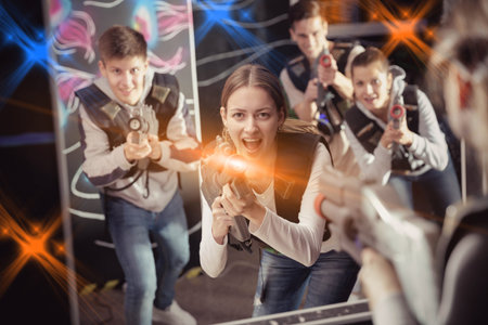 Excited girl during lasertag game