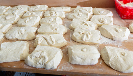 Portioned pieces of dough prepared for shaping in bakery